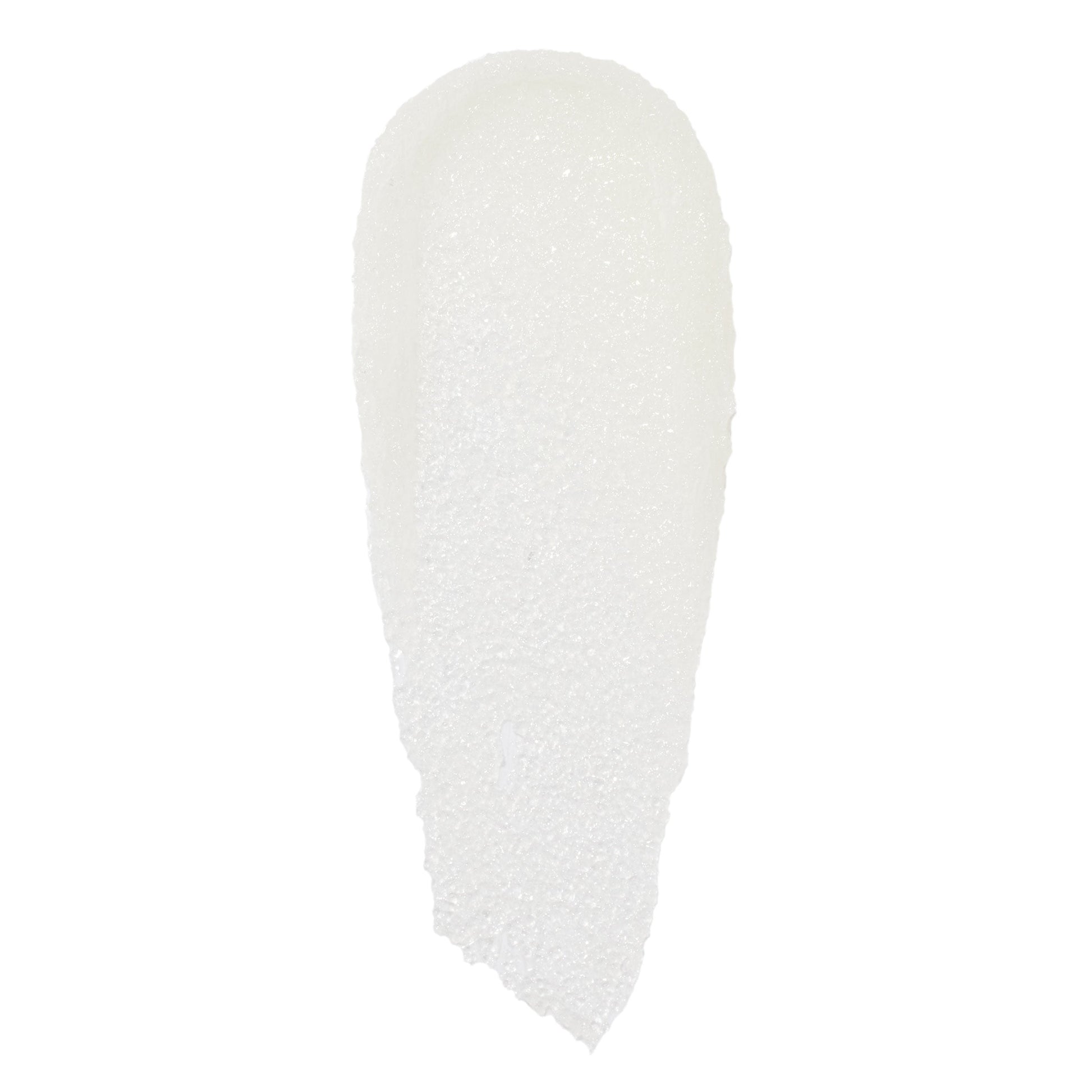 Translucent white, sugar-granule swatch of Just One Bite ColourPop Lip Scrub, smeared in a single elongated swipe with fine crystals catching light on a clean white background.