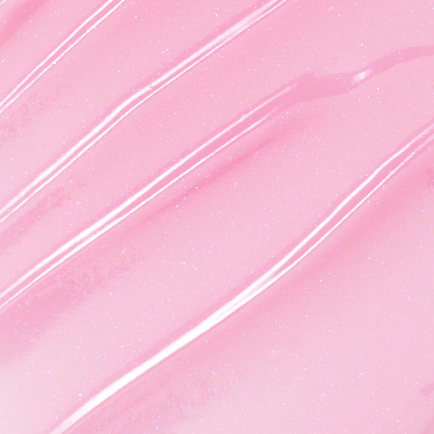 You're a Catch ColourPop Lip Mask swatch gliding in diagonal streaks, showing a sheer baby pink, glossy, micro-shimmer finish in a close-up texture shot.