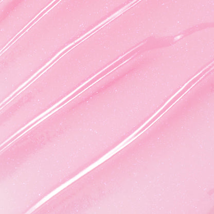You're a Catch ColourPop Lip Mask swatch gliding in diagonal streaks, showing a sheer baby pink, glossy, micro-shimmer finish in a close-up texture shot.